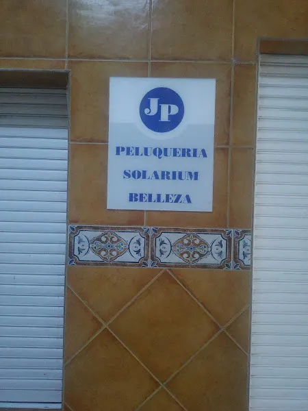 J P