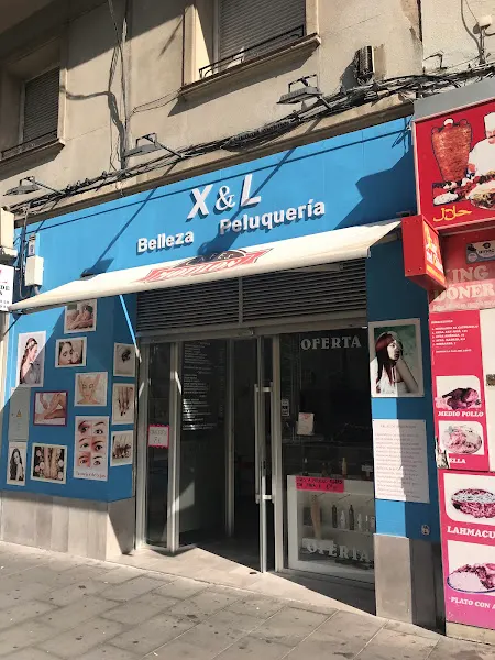 X&L Peluquería Belleza Y Productos De Cosmética - Peluquería en Zaragoza - foto 2