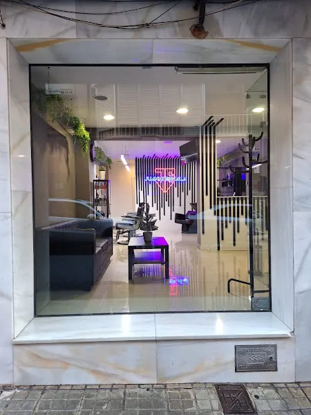 JUANMI ESCALA PELUQUEROS