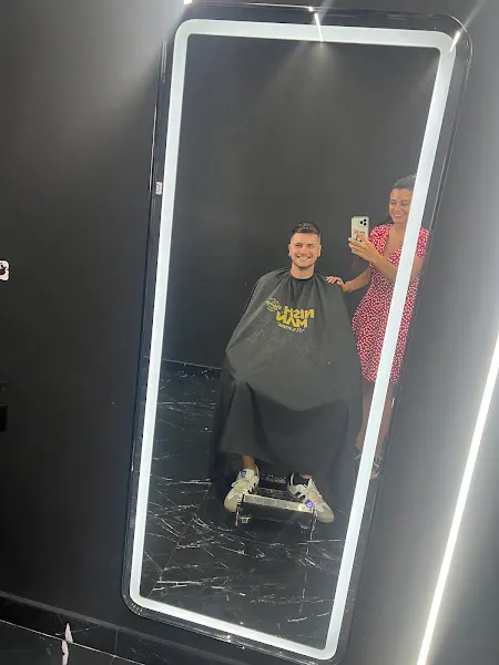 AKA BARBER CORP