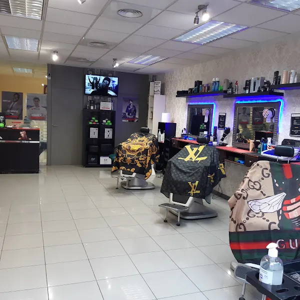 GOLDEN FINGERS BARBER SHOP & TATTOO